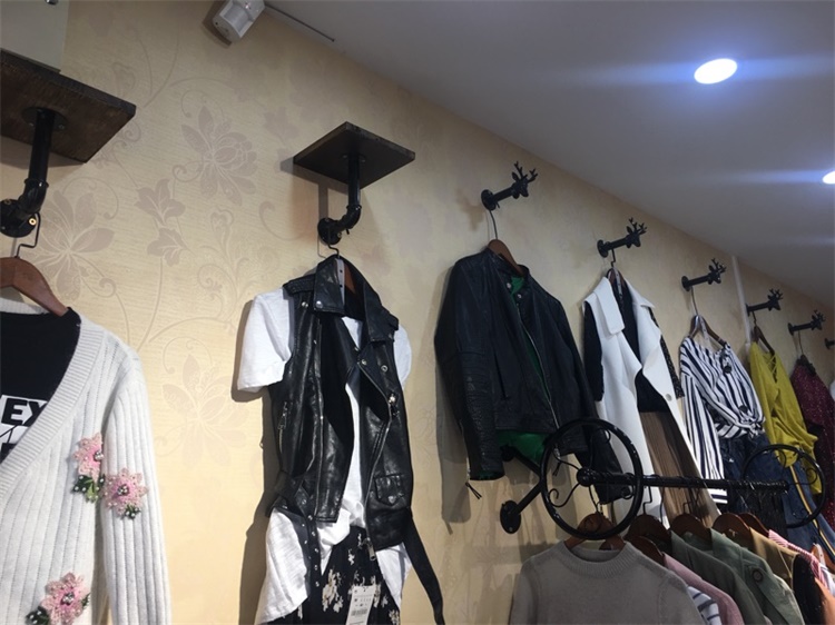 微店店招裝修圖片_服裝店裝修_兩元店及多元店裝修效果圖